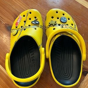 Post Malone yellow first addition crocs.